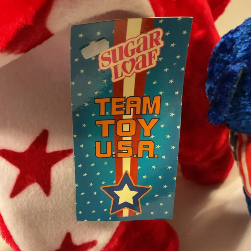 Red, white and blue stuffed animal pair